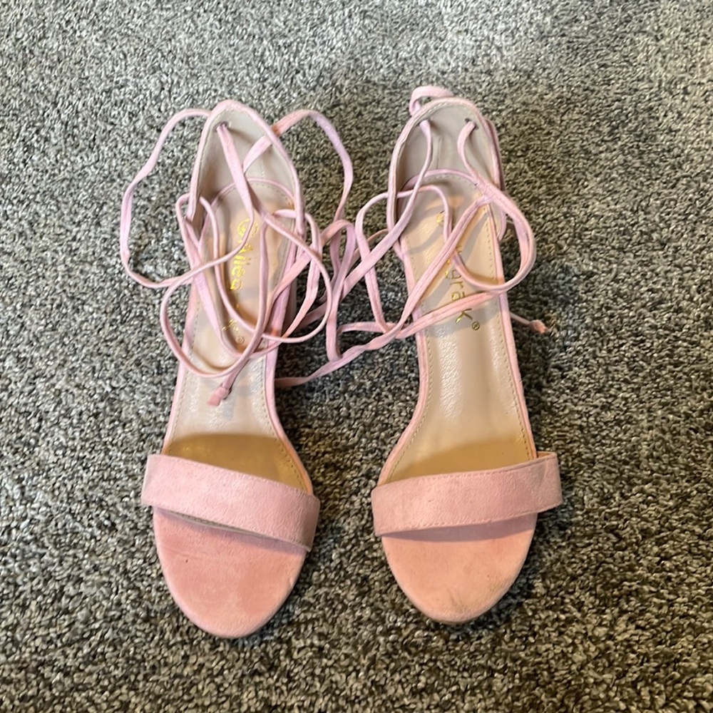 Pink strapped heels size 9. Worn once. Will fit size 8